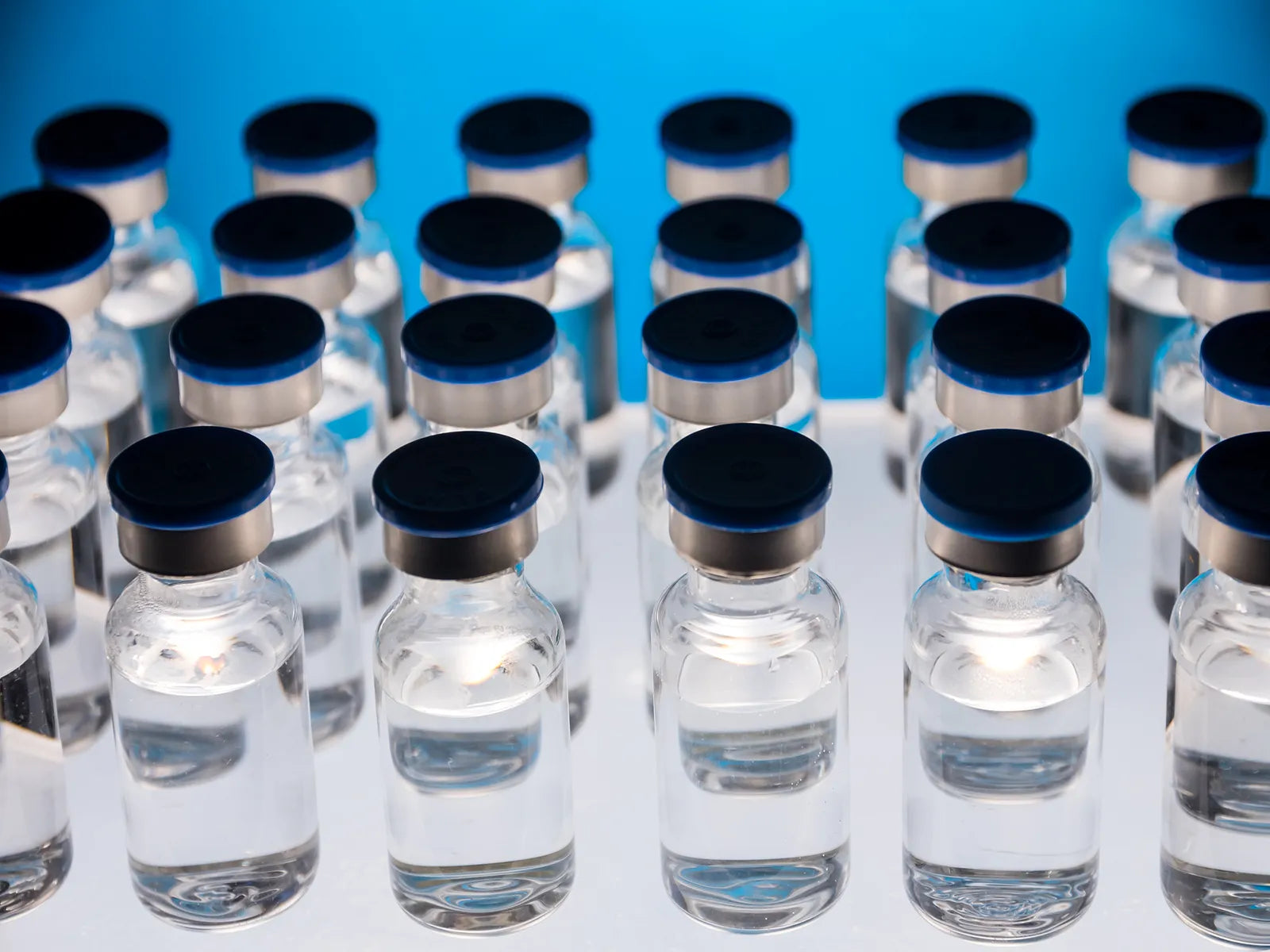 Clean laboratory workspace with neatly arranged peptide vials and packaging, symbolising Tide Labs wholesale research peptide supply and bulk partnership enquiries