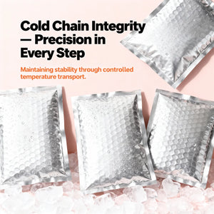 Silver insulated cold chain shipping pouches with condensation on ice, highlighting controlled temperature transport.